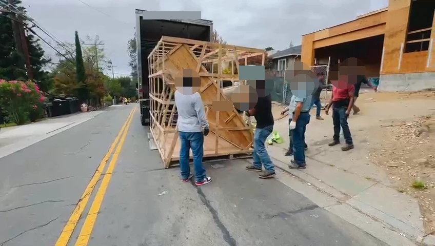 Actual residential handover footage of crated goods from the completed U.S. doors-and-windows project.